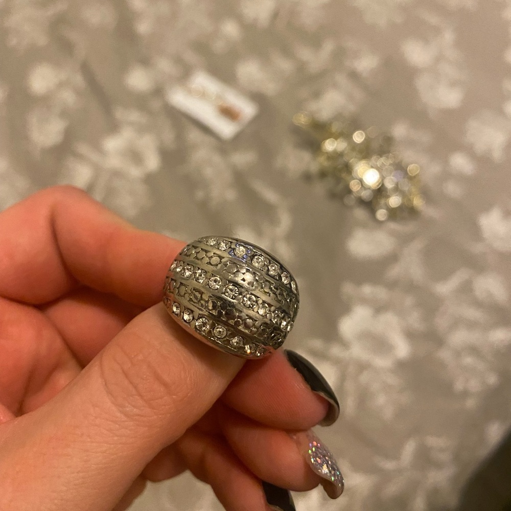 Silver diamond ring size medium.